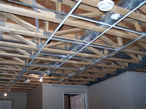 Dont assume the wall is straight. How to Install an Acoustic Drop Ceiling - quinju.com