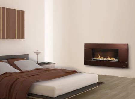 This beautiful master bedroom features a modern gas fireplace trimmed in metal. ESCEA Indoor Gas Florentine Bronze Fireplace - Ferro Front ...