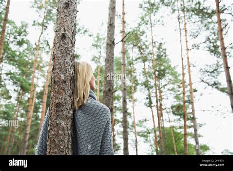 Woman Leaning Against Tree Hi Res Stock Photography And Images Alamy
