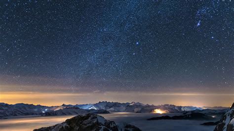Sunset Sky With Blue Stars Up Above The Snow Covered Mountain Hd Space