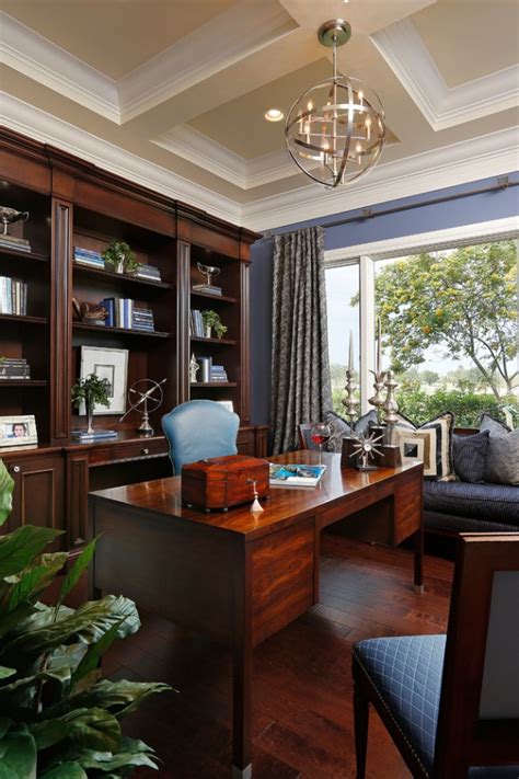 This modern farmhouse design has multiple gables, mixed use of siding and dark stained accents accentuate the style. 15 Awesome Home Office Designs To Boost Your Productivity