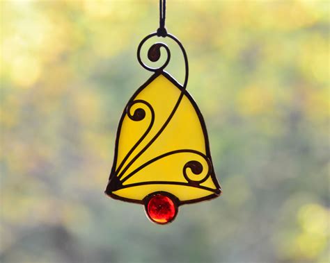 Each piece of stained glass is hand cut, ground smooth, carefully copper foiled and then soldered together to create this fun piece. Christmas bell ornaments, stained glass suncatcher ...