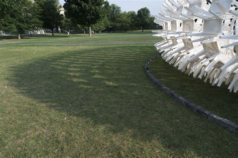 Gallery of How CODA Used Hundreds of White Plastic Chairs To Build A