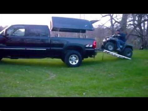 Not everyone wants a topper installed all the time though and they're a pain. Loading ATV with truck topper - YouTube