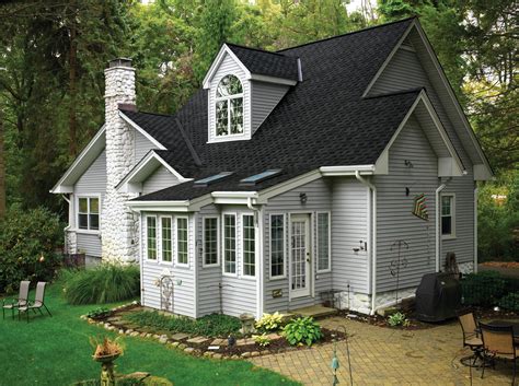 A black roof will usually make a tall house look shorter; GAF | Grand Sequoia ArmorShield Shingle Documents