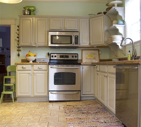 Installing wall cabinets frees up counter space, adds additional storage space and improves the look and functionality of your kitchen. cabinets: Martha Stewart's "Bedford Gray," mint walls ...