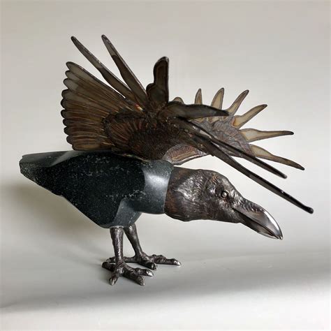 Raven Sculpture Dynamically Rendered In Stainless Steel And Granite