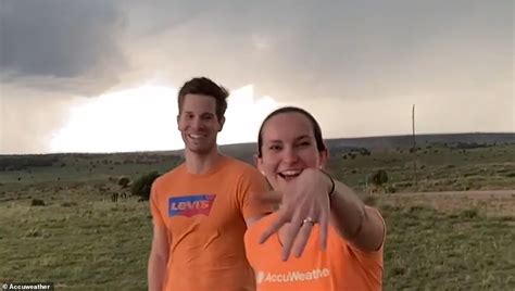 meteorologist couple gets engaged in front of a tornado after driving 6hrs to see their 1st