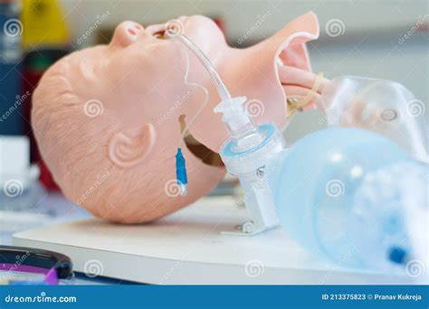 Medical Training Intubation Of A Child Sized Manikin Using An