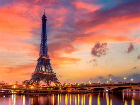 La construcción más famosa de francia inauguró el lunes su renovada primera planta que incluye pisos de vidrio. Cuadro Dibond Paisaje Torre Eiffel Atardecer - Oedim Decor
