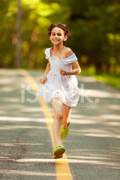 Little Girl Run In The Park Stock Photo Royalty Free Freeimages