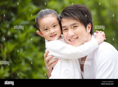 Daughter Embracing Her Father Smiling Portrait Stock Photo Alamy