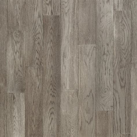 An Image Of Wood Flooring With Grey Tones