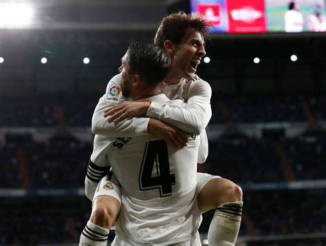 Sergio Ramos And Alvaro Odriozola Of Real Madrid Celebrate After