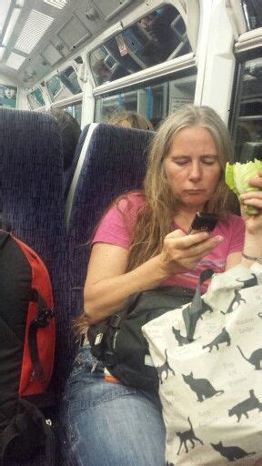 Woman On Train Just Casually Eating An Entire Head Of Lettuce