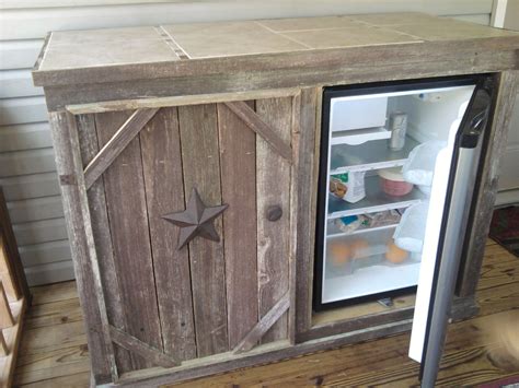 This barn door cabinet holds a mini fridge and microwave! Thirteen Pine | Outdoor refrigerator, Outdoor refrigerator ...
