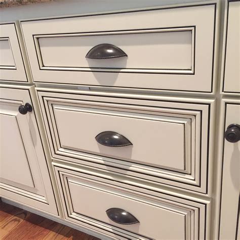 The beautiful cream finish is enhanced by the brushed glaze. What is Cabinet Glazing? - Bella Tucker Decorative Finishes