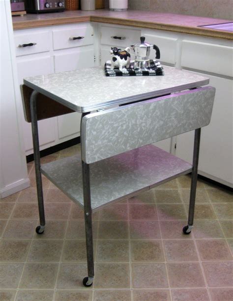 Check out our formica kitchen table selection for the very best in unique or custom, handmade pieces from our kitchen & dining tables shops. vTg 1950s cracked ice formica drop-leaf kitchen cart table ...