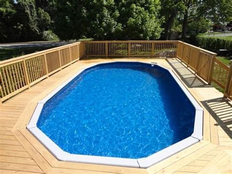 How To Design The Above Ground Pool Decks With Wooden Oval Above