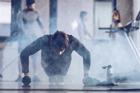 Sportsman Doing Push Ups — Stock Photo © Arturverkhovetskiy 153033184