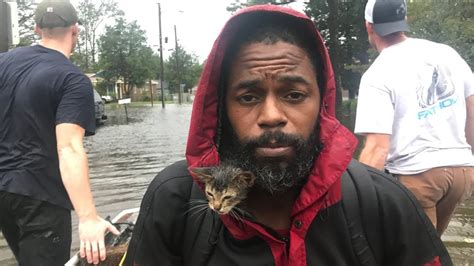 A Man And His Survivor Kitten Escape The Floodwaters From Hurricane