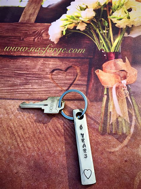While traditionally iron represents the 6th year of anniversary, modern representation is usually considered to be done by calla lily and amethyst. 6th Year Iron Wedding Anniversary Keychain Gift Idea for ...