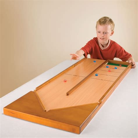 The Classic Rebound Shuffleboard Game Hammacher Schlemmer