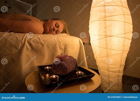 Woman Enjoying Relaxing Back Massage In Cosmetic Spa Centre In S Stock