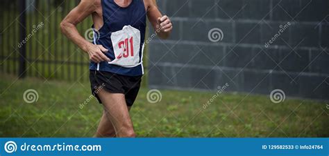 Old Man Athlete Running By Summer City Park Marathon Stock Image