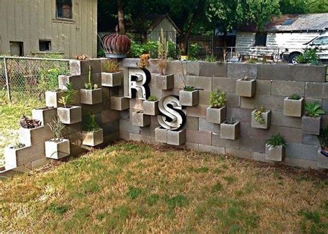 The wall will blend in with most architectural styles. Original Cinder Block Ideas for DIY Yard Decorations