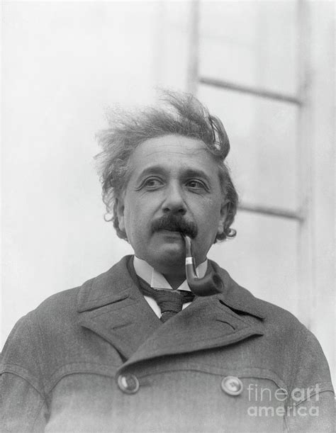 Albert Einstein Smoking A Pipe Photograph By Bettmann Pixels