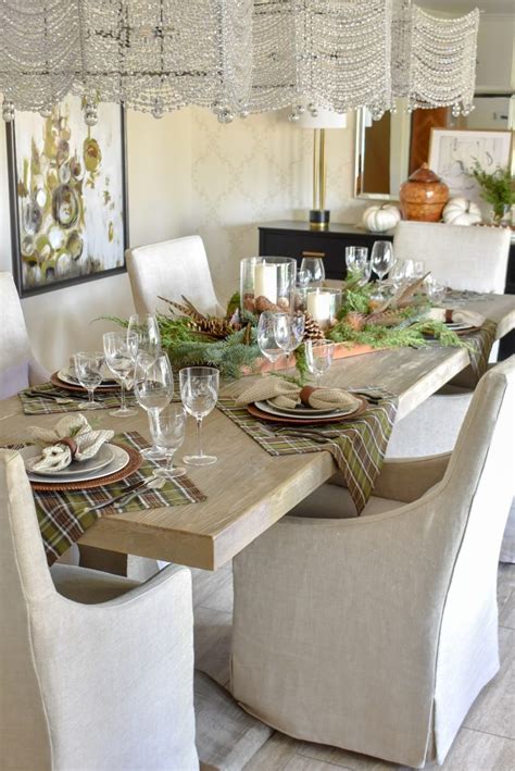 I started with a crisp white linen table cloth and a green buffalo check table runner and coordinating napkins, which hint to the green color palette of summer. Casual Evergreen Thanksgiving Table Setting - Home with ...