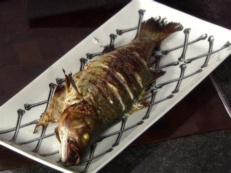Read on to see what makes these tacos so special. Whole Grilled Fiesta Fish Recipe | Guy Fieri | Food Network