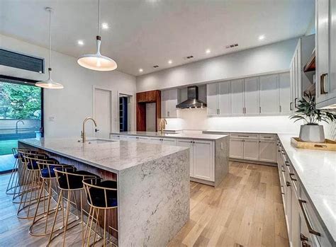 The modern farmhouse exterior look often includes board and batten and lap siding. Kitchen With Two Islands (Design Ideas) - Designing Idea