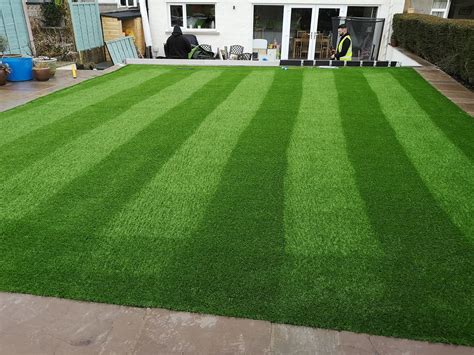 We do not recommend installing artificial grass on black soil so spread a layer of about 10 cm of yellow sand or crusher dust. Artificial Grass Installation | Lancaster - Putt It Right Ltd