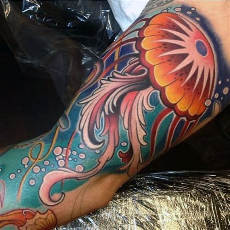 The tentacles are also long and well drawn to suggest gracefulness in movement. 100 Jellyfish Tattoo Designs For Men - Free-Swimming ...