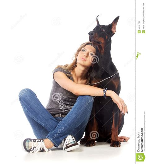 Young Woman With Black Dobermann Dog Royalty Free Stock