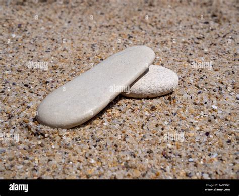 A Pile Of Stones Pile Of Stones Stacked On The Beach Sand Pastel