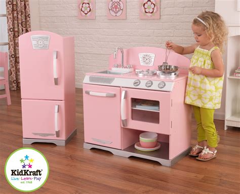 Give your little ones a kitchen of their own with this product. Good Wood Play Kitchen Sets - HomesFeed