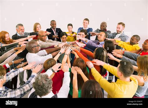 Business People Connecting Hands In Huddle Stock Photo Royalty Free