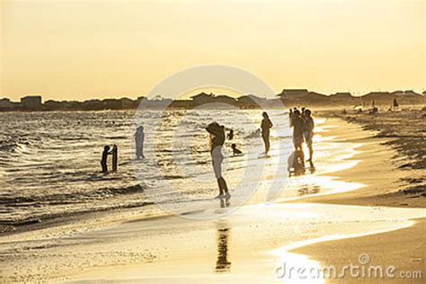 People Enjoy The Beautiful Beach In Late Afternoon At Dauphin I