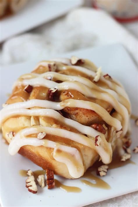 While rolls are baking, cream together the cream cheese and powdered sugar. Apple Pecan Cinnamon Rolls with Cream Cheese Frosting