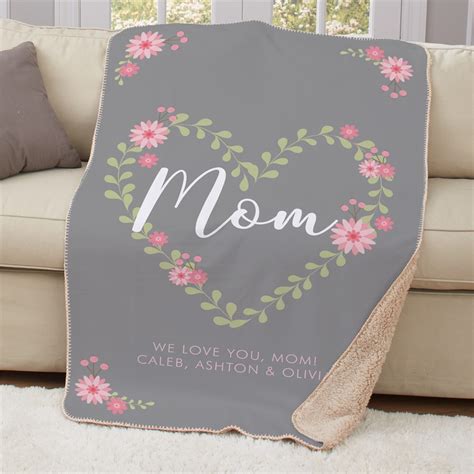 The reversible blanket is the ultimate gift for your friends and family. Personalized Mom Floral Heart Sherpa Throw | GiftsForYouNow