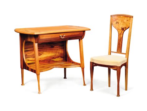 An Art Nouveau GonÇalo Alves Marquetry And Mahogany Desk And Chair