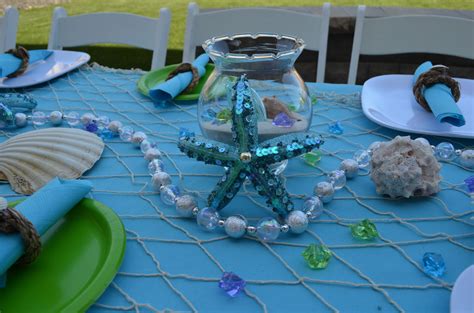 Check out our decorating ideas selection for the very best in unique or custom, handmade pieces from our shops. Table decorations at our under the sea party #underthesea ...