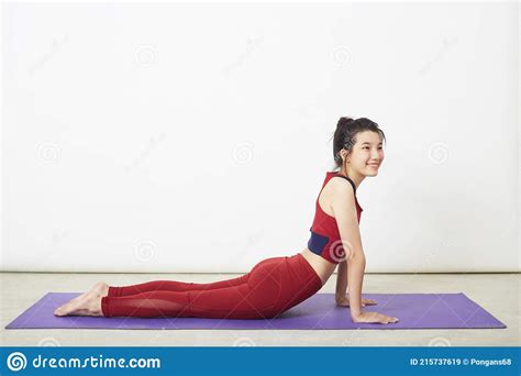 Active Woman Practicing Yoga At Home Stock Image Image Of Gymnastics Life 215737619