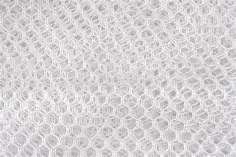 Texture Or Background Of Mesh Fabric In White Mesh Material Stock