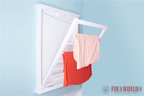 I drilled holes in the sides for 1/2 dowels. DIY Clothes Drying Rack | FixThisBuildThat