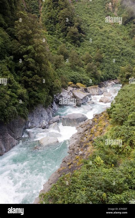 Haast River Running Through Gorge At Gates Of Haast South Island New