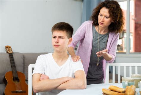 Mother Scolding Troubled Teen Boy Stock Photo Image Of Parenthood